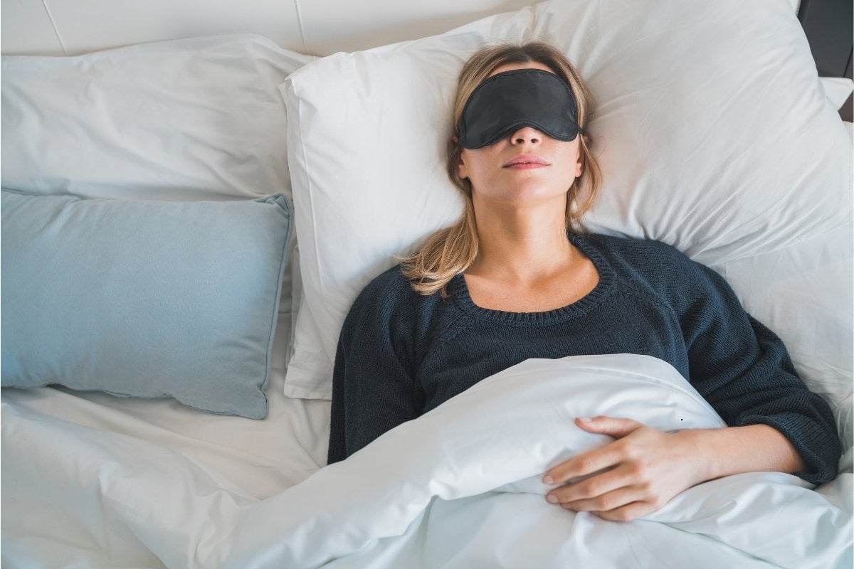 Woman sleeping with eye mask on