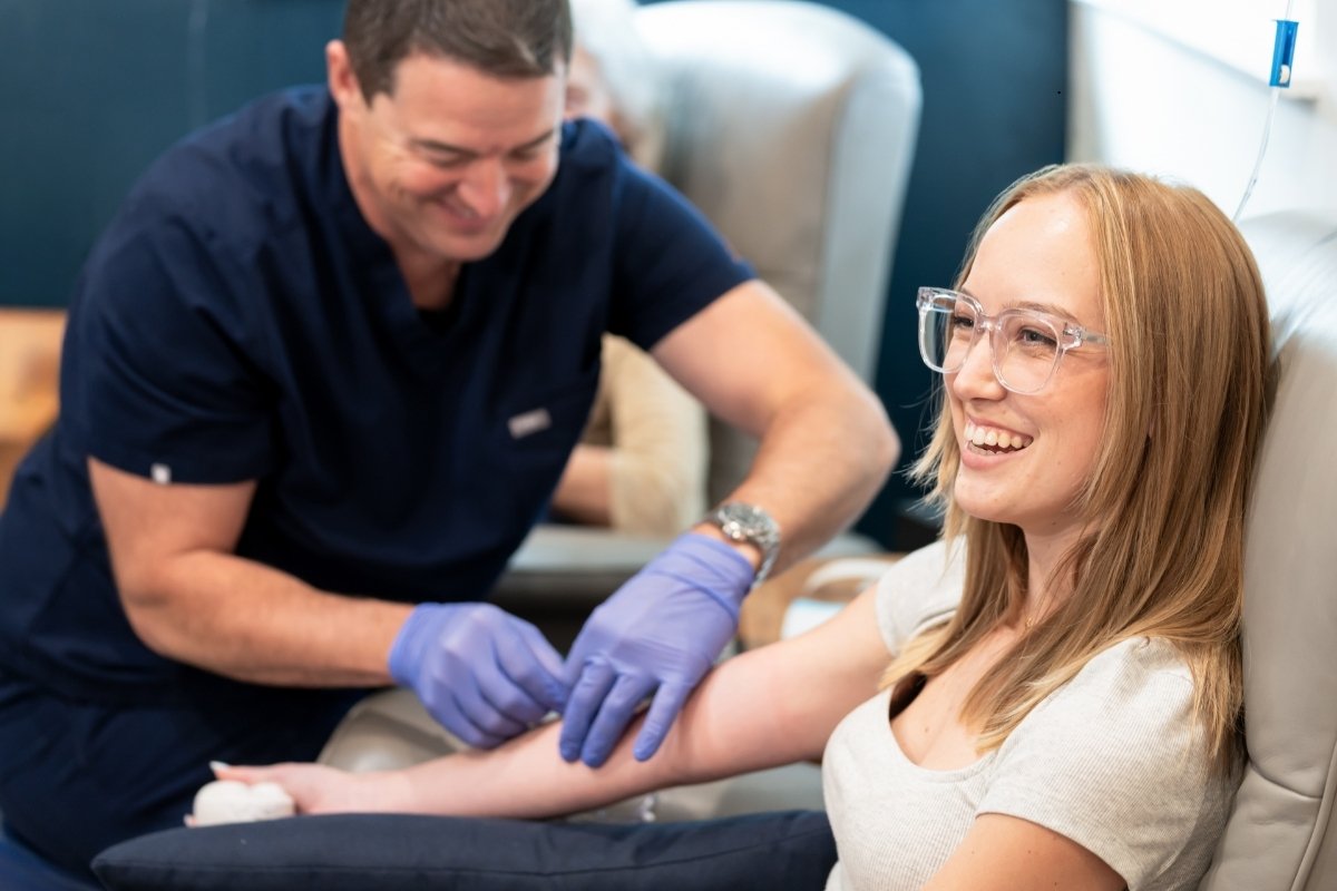 Male doctor treating female patient YNWC