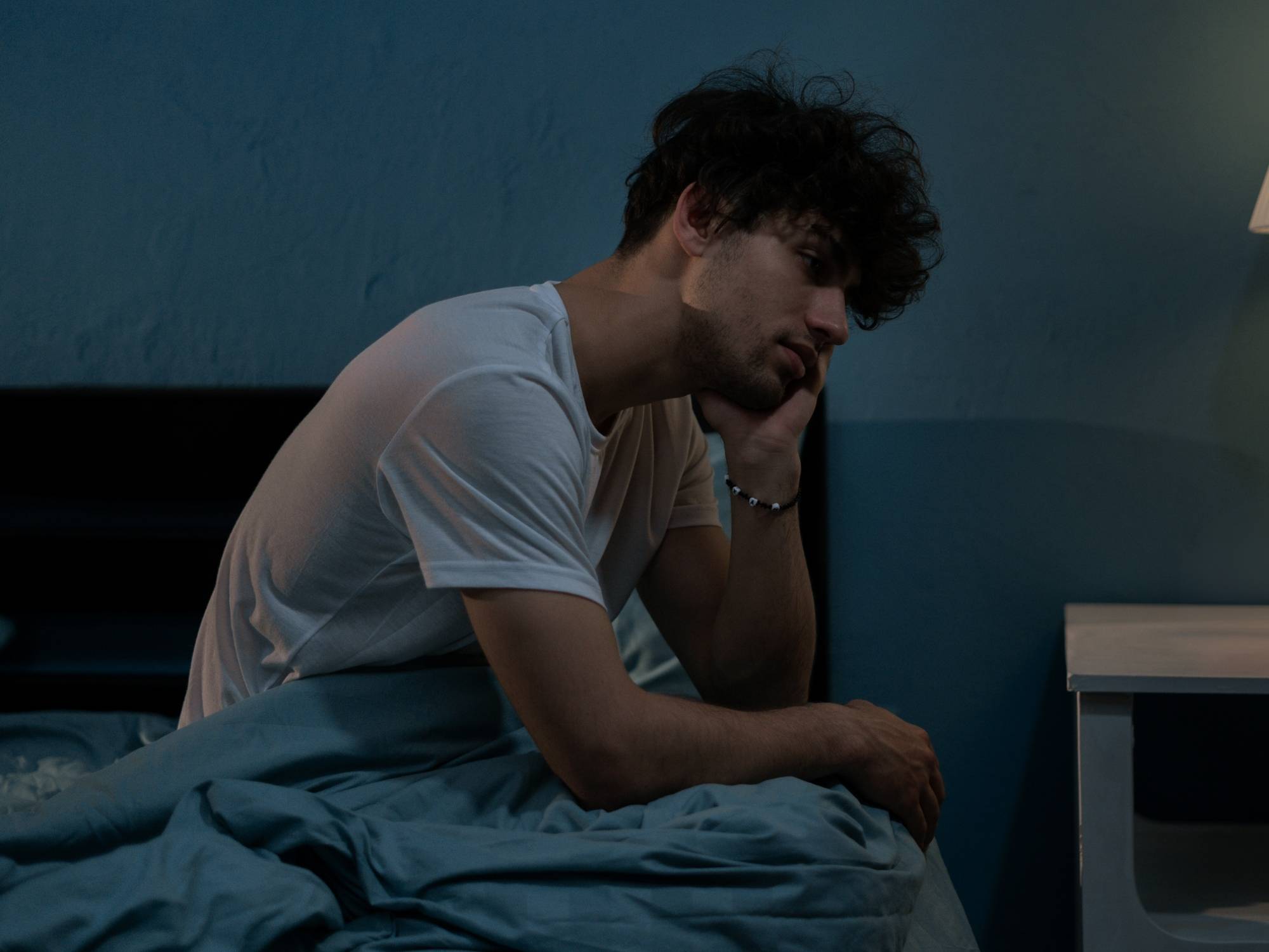 Man looks pensive due to insomnia