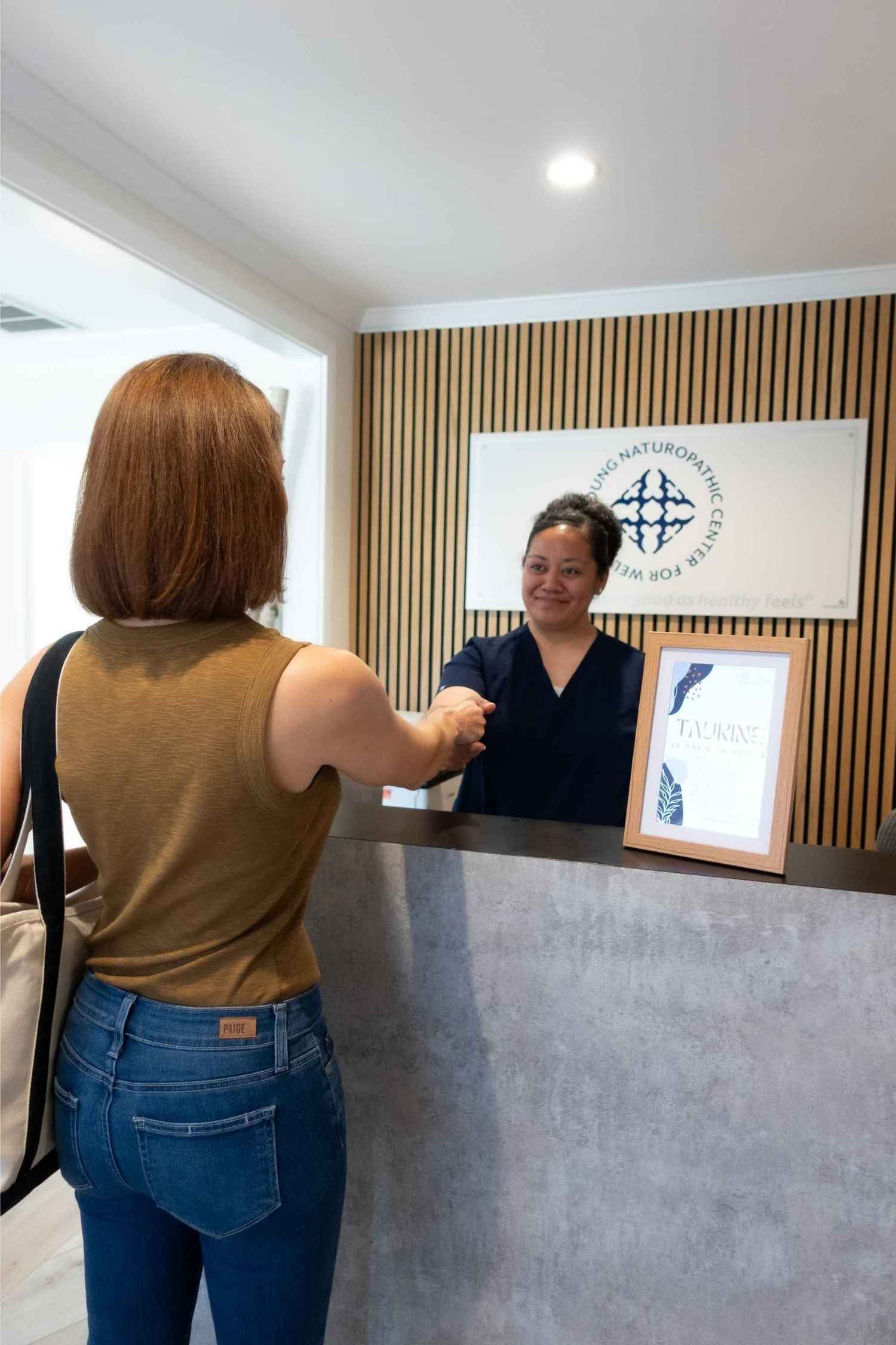 Front of house at YNC greeting customer (2)